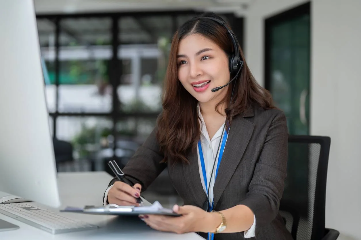 A notebook and warm drink on a table, representing a calm Short Term Respite enquiry conversation